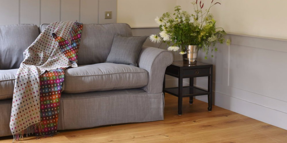 large loose covered grey linen sofa