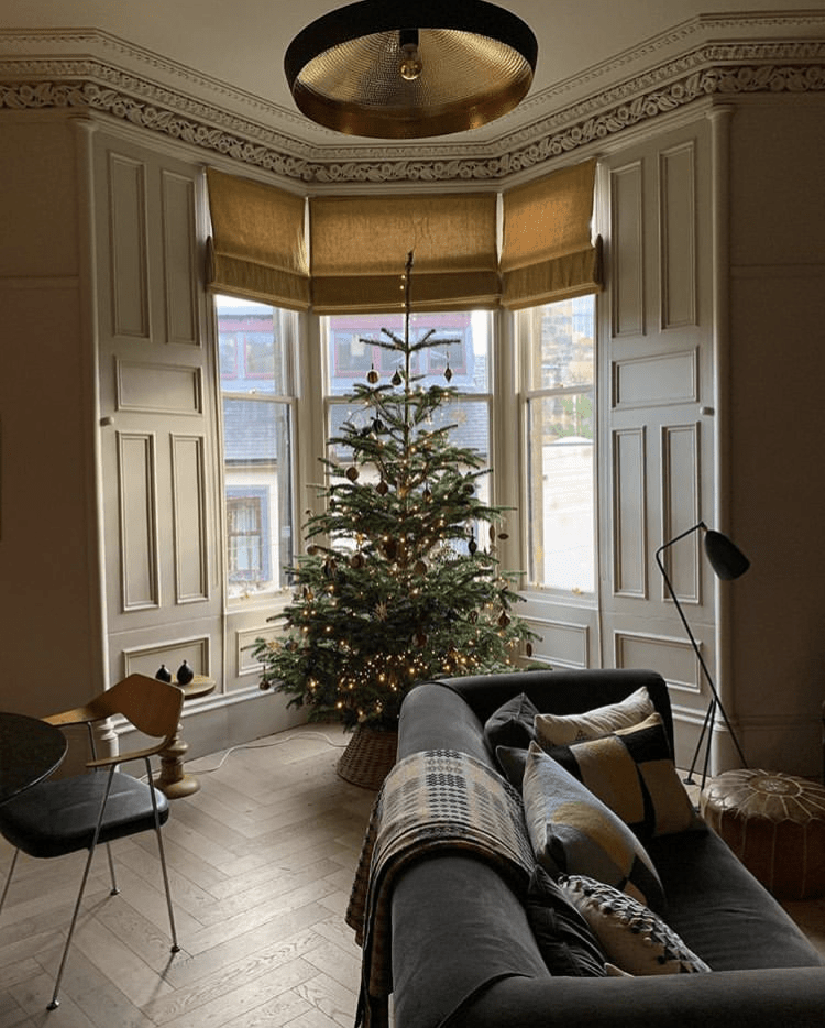 Cosy home featuring our customer Niki's Christmas tree next to her Brighton sofa