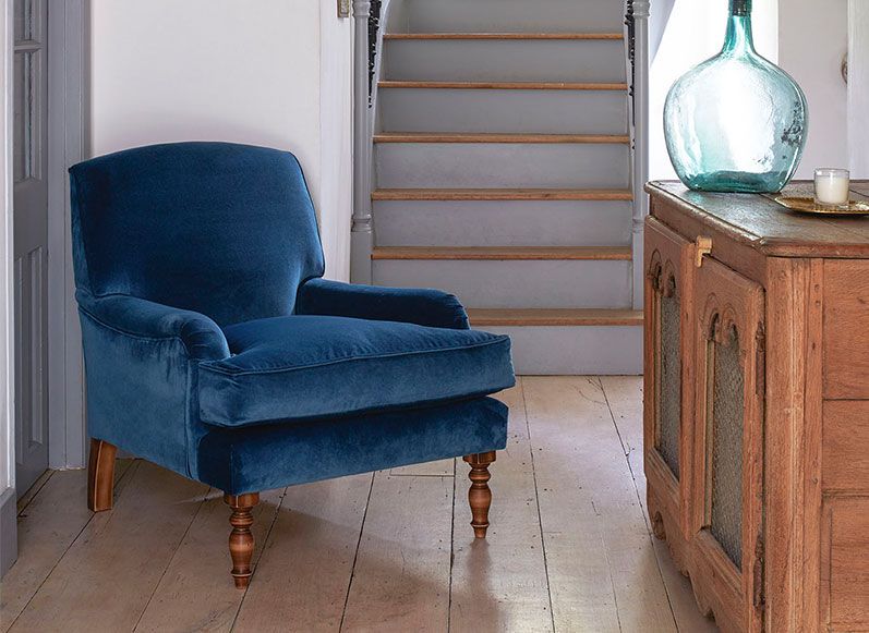 Blue velvet armchair