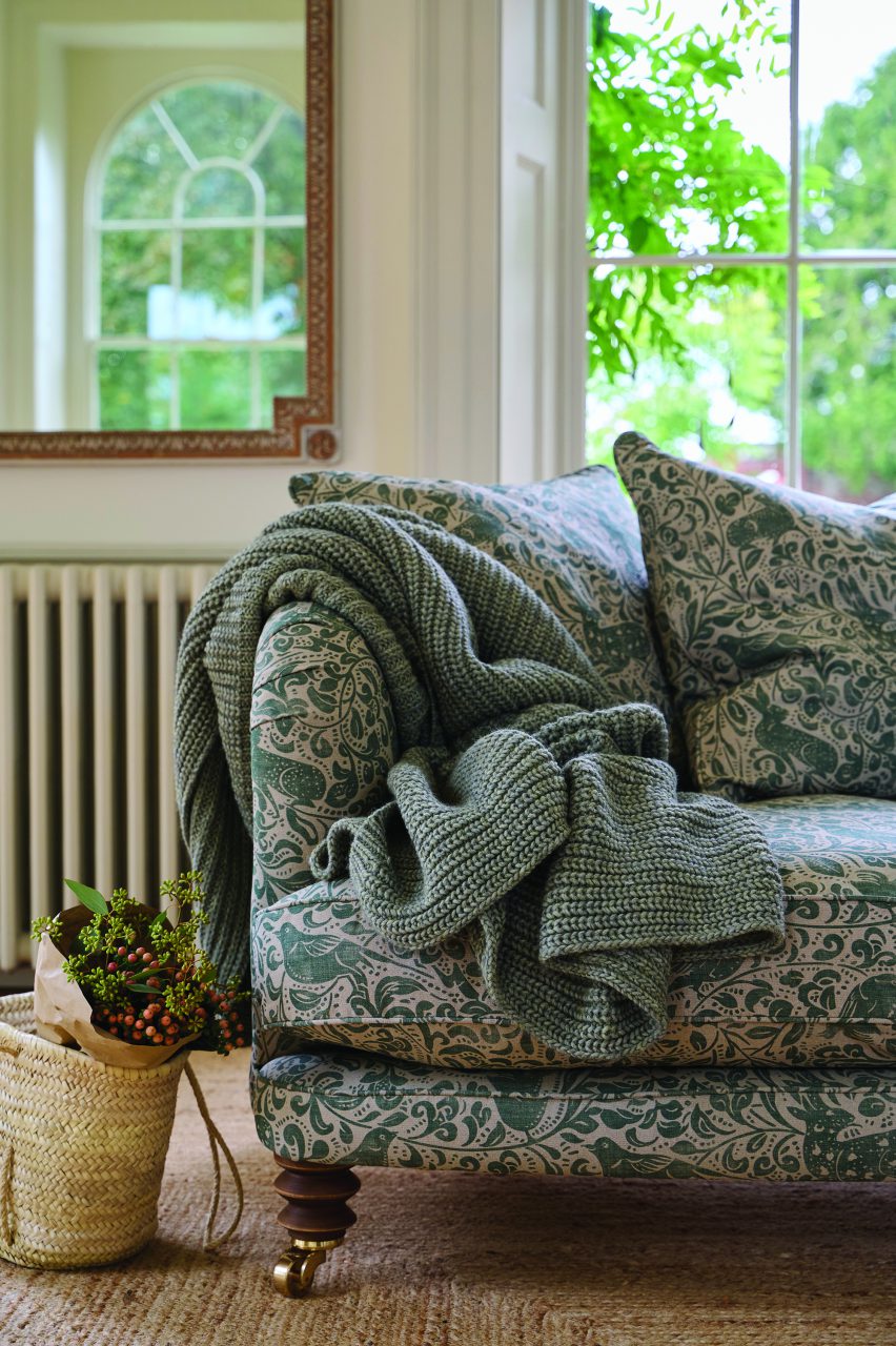 Sofas & Stuff printed fabric sofa featuring V&A Drawn from Nature Bird & Rabbit in Dark Green.