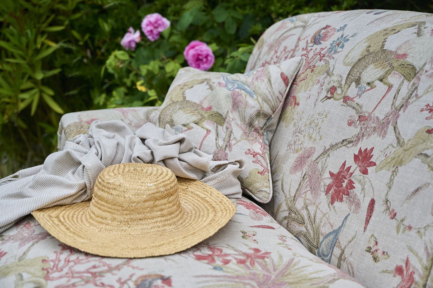 https://blog.sofasandstuff.com/wp-content/uploads/2023/04/Tangmere-3-Seater-Sofa-in-Floral-Linen-Lily-Pad-Vermillion-cropped-landscape-1.jpg